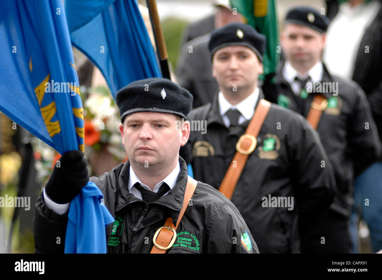 April 09, 2012 - Londonderry, Northern Ireland, UK - A colour party leads the dissident republican 32 County Sovereignty Movement's commemoration of the 1916 Easter Rising at the City Cemetery. Stock Photo