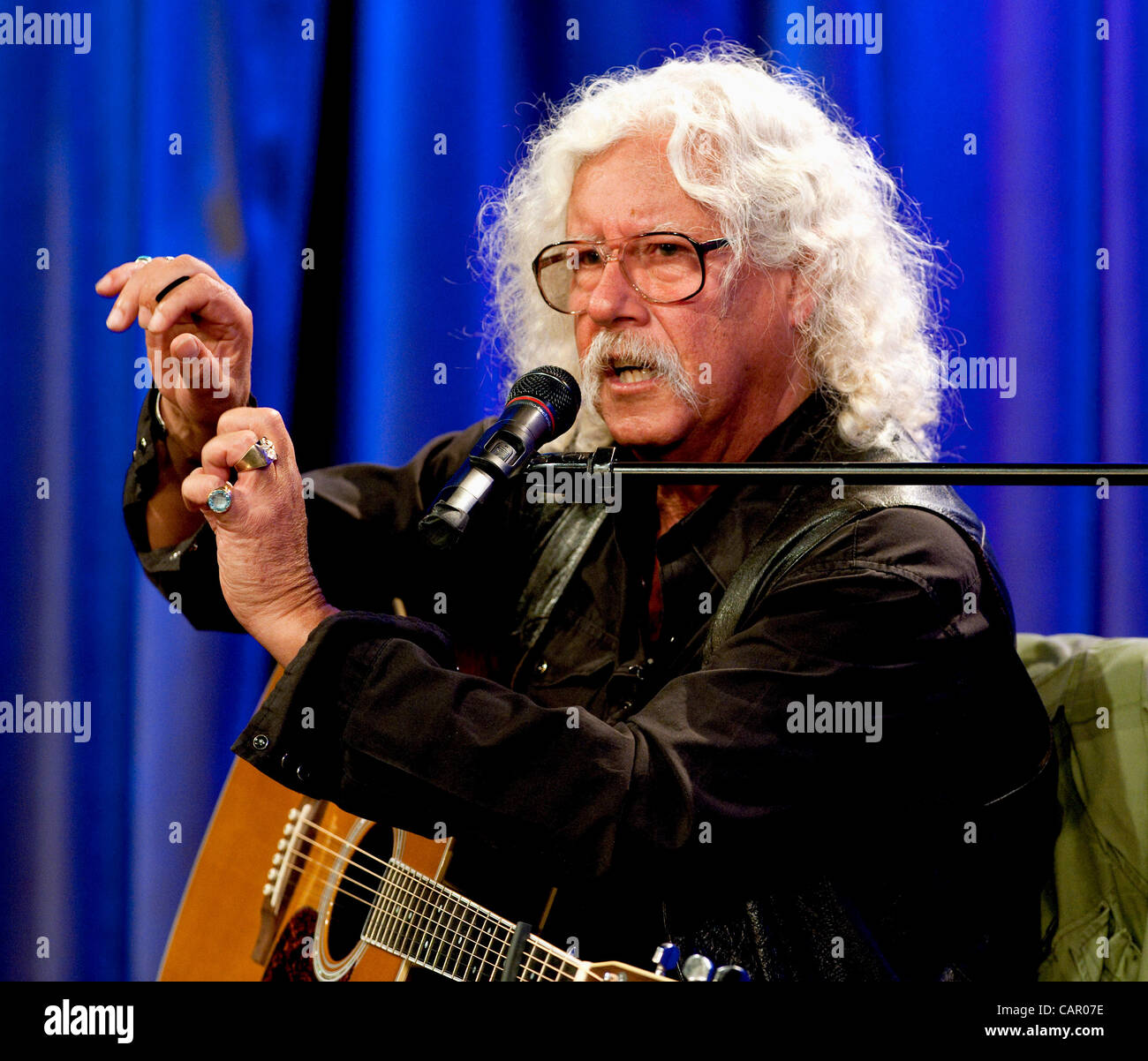 April 09, 2012 - Los Angeles, CA, USA -  ARLO GUTHRIE discusses his music career and that of his father, Woody Guthrie, during the Woody Guthrie Centennial Celebration at the GRAMMY Museum. Stock Photo