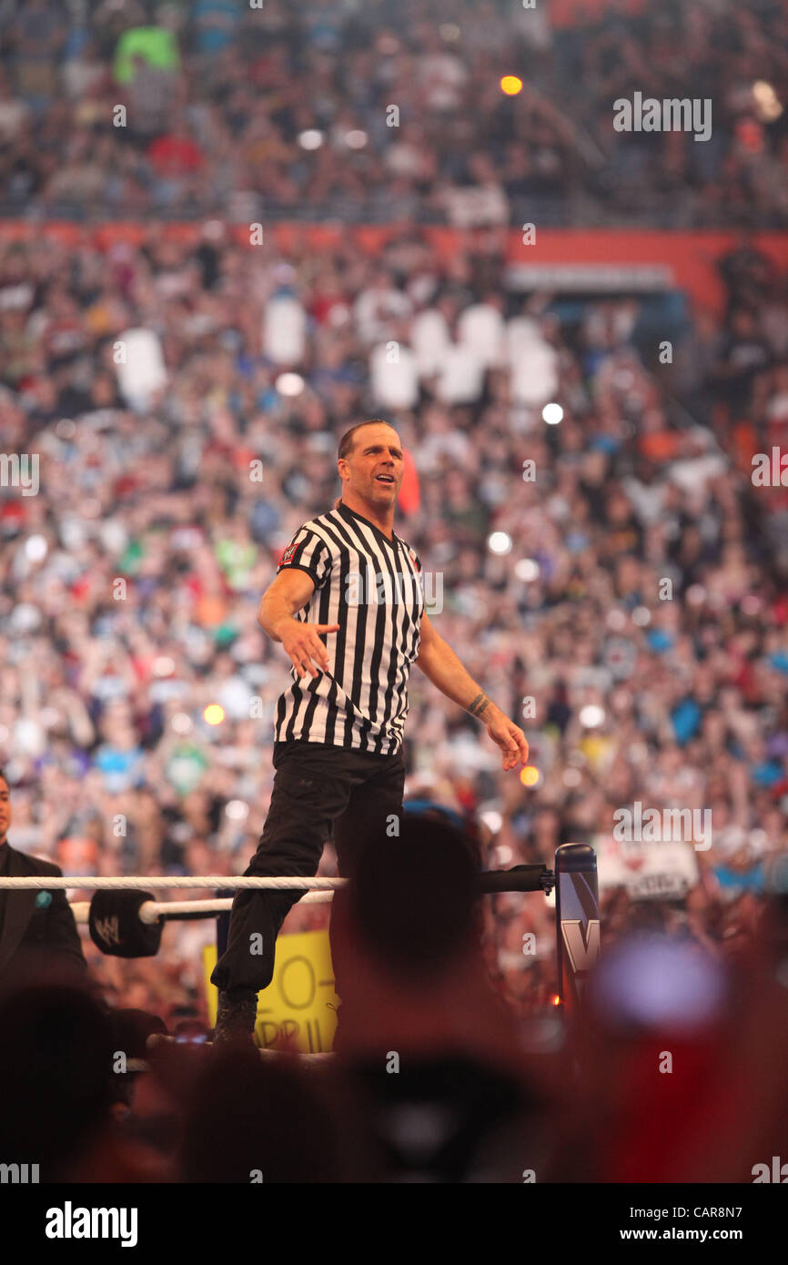 WWE legends The Undertaker wrestled Triple H at Wrestlemania 28 in Miami, FL at Sun Life Stadium. WWE Hall of Famer Shawn Michaels served as the special referee. The Undertaker won, advancing his streak to 20-0 at Wrestlemania events. Stock Photo