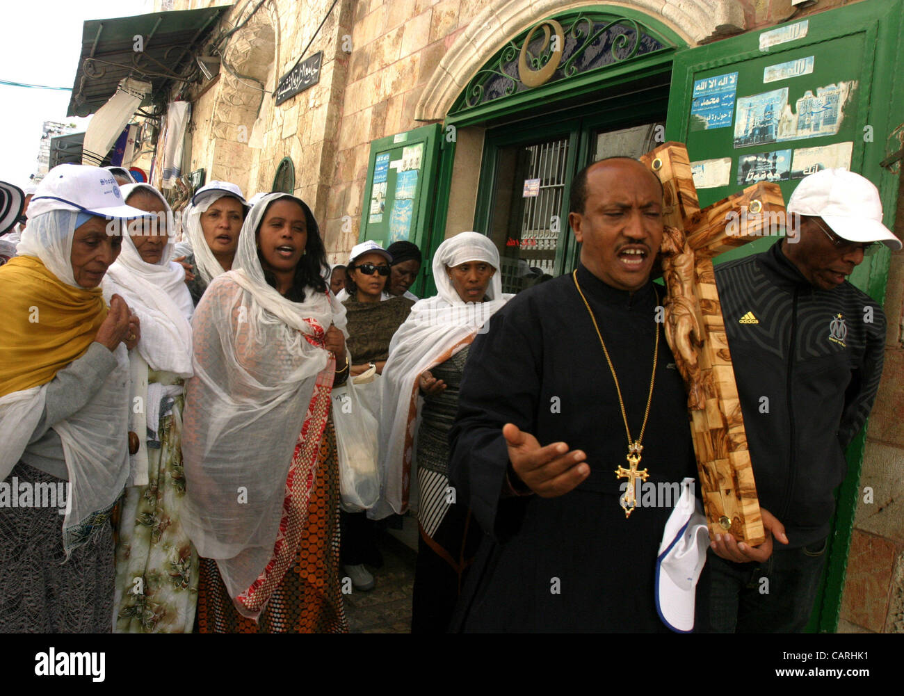 April 13, 2012 - Jerusalem, Jerusalem, Palestinian Territory - Orthodox Christian worshippers from Ethiopia carry a large cross during a Good Friday procession on the Via Dolorosa, retracing the route Jesus Christ walked to his crucifixion in Jerusalem, Israel, 13 April 2012. Thousands of pilgrims,  Stock Photo