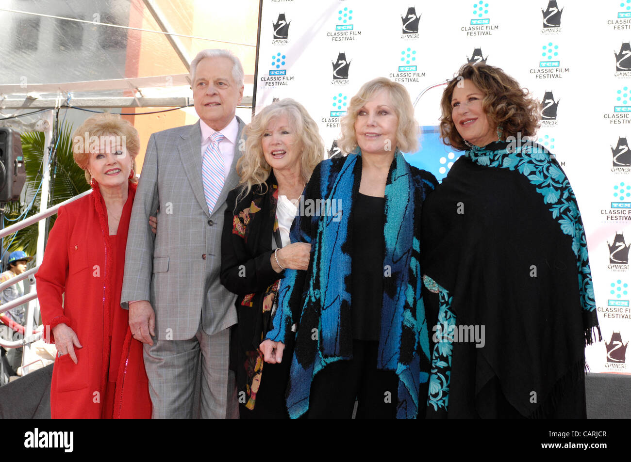 April 14, 2012 - Hollywood, California, U.S. - Debbie Reynolds, Robert Osborne, Connie Stevens, Kim Novak and Lainie Kazan during a ceremony honoring Kim Novak with her Handprints and Footprints immortalized in cement, at Grauman's Chinese Theatre, April 14, 2012, in Los Angeles.(Credit Image: Â© Mi Stock Photo