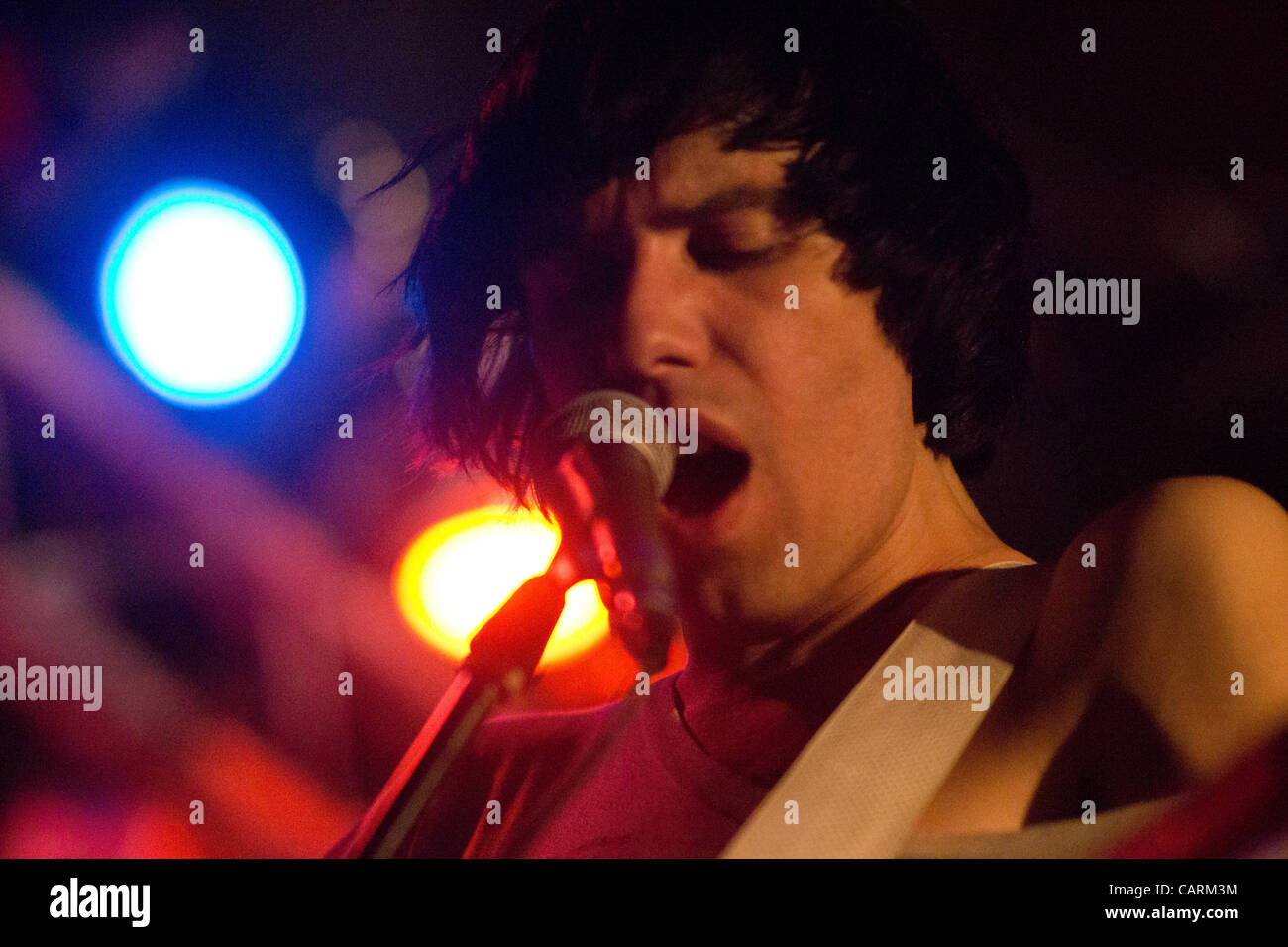 Close up of guitarist and vocalist Ryan Jarman as he performs in Brighton Music Hall on April 14, 2012. Stock Photo
