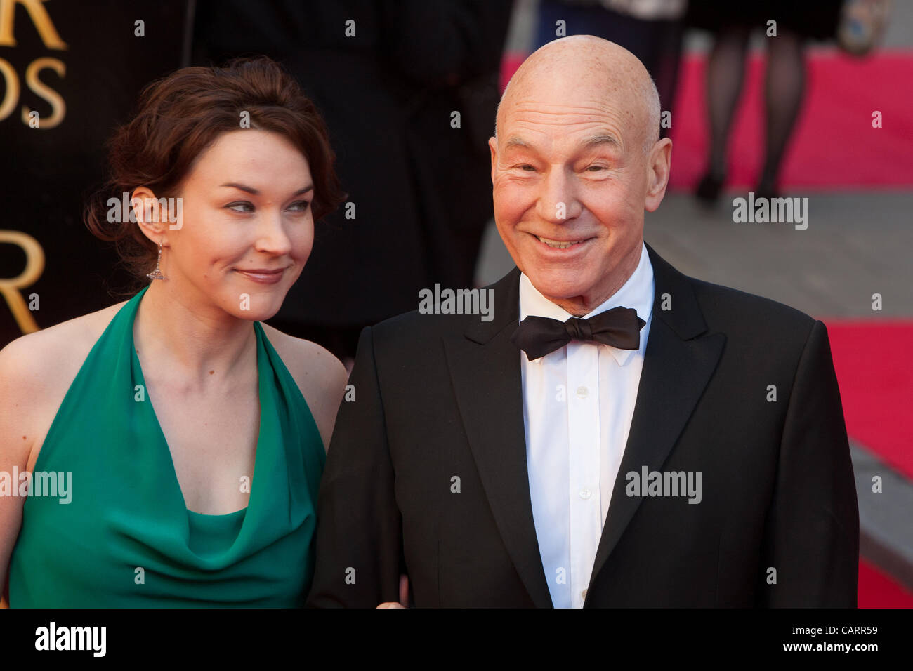 London, UK, 15/04/2012. Actor, Patrick Stewart with Sunny Ozell , arrive at the 2012 Laurence Olivier Awards Stock Photo