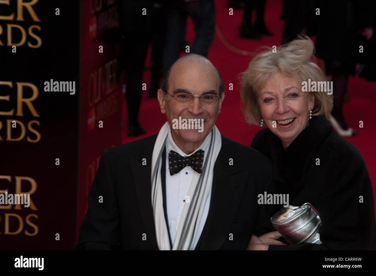 London, UK, 15/04/2012. Actress, David Suchet with his wife Sheila Ferris, a former actress, arrives at the 2012 Laurence Olivier Awards Stock Photo