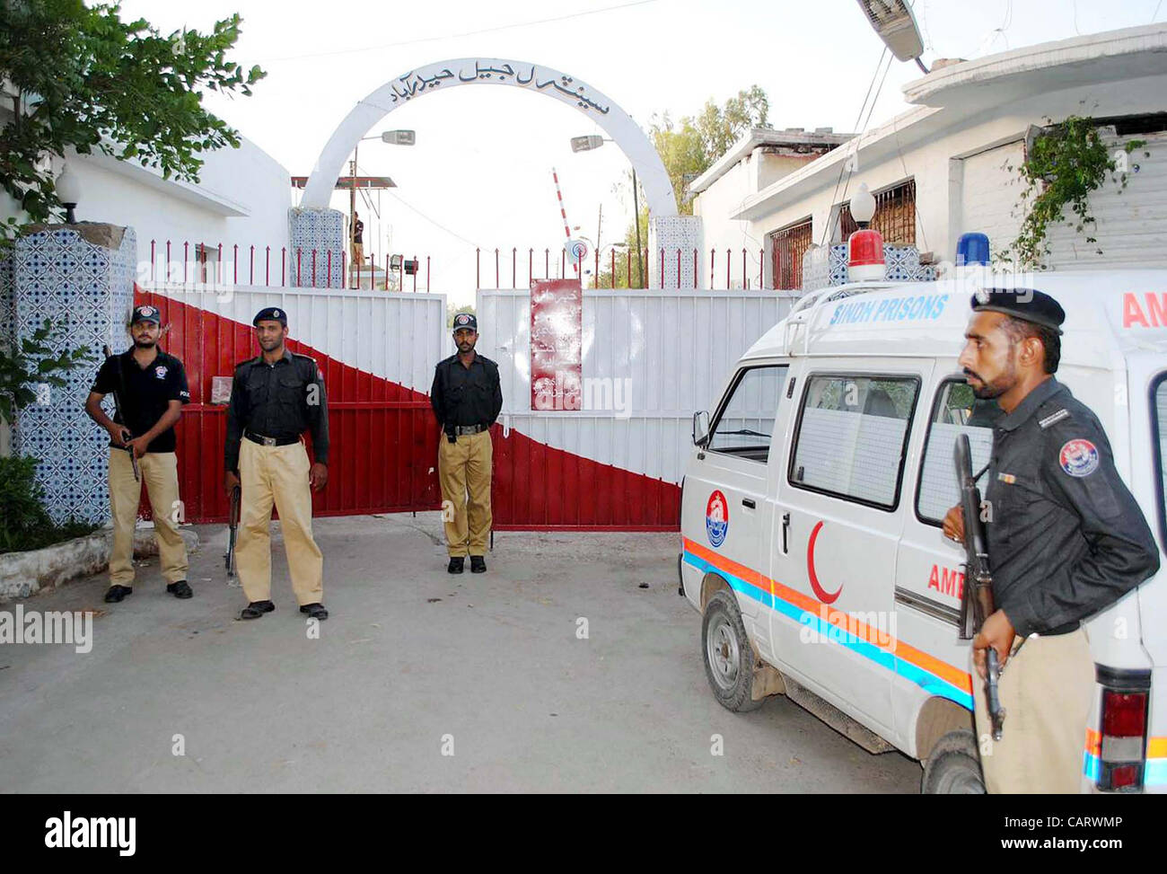 Policemen stand guard at central prison as four prisons in Sindh province including Hyderabad central prison, Karachi central prison, Landhi prison and Sukkur prison are declared sensitive on Monday after militants attack at Bannu prison, in Hyderabad on Monday, April 16 Stock Photo