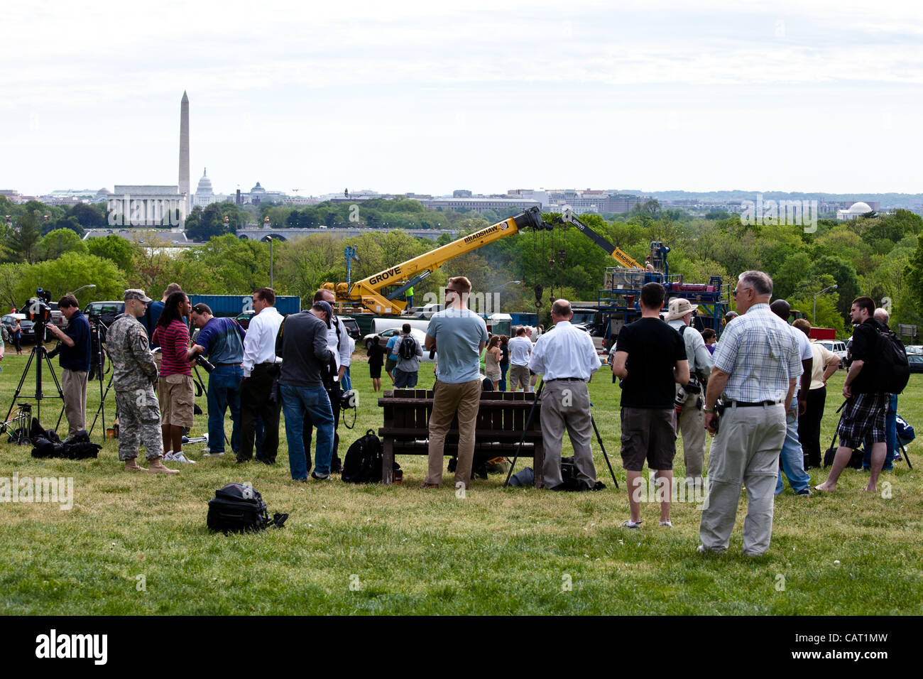 April 17, 2012 - Washington, DC, U.S. - Space shuttle Discovery, mounted on the Shuttle Carrier Aircraft, has flown over the Washington, D.C. area. Onlookers are watching the final flight and taking pictures. (Credit Image: © Dasha Rosato) Stock Photo