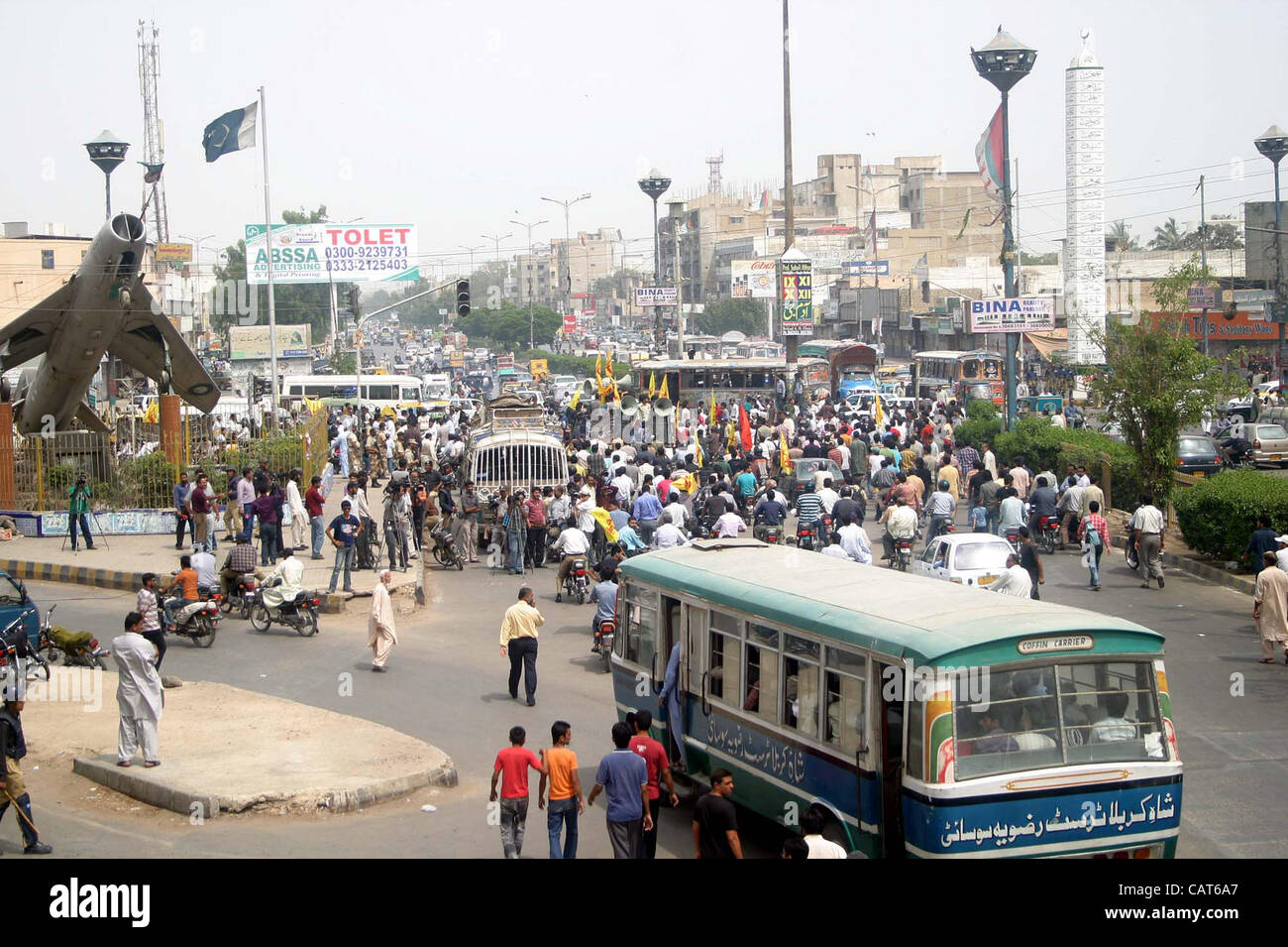 People carry coffin of Imran Zaidi, the vice Principal of Jinnah Polytechnic College, who was gunned down in firing incident yesterday, for burial after his funeral prayer at Rizvia Imambargah in Karachi on Wednesday, April 18, 2012. Stock Photo