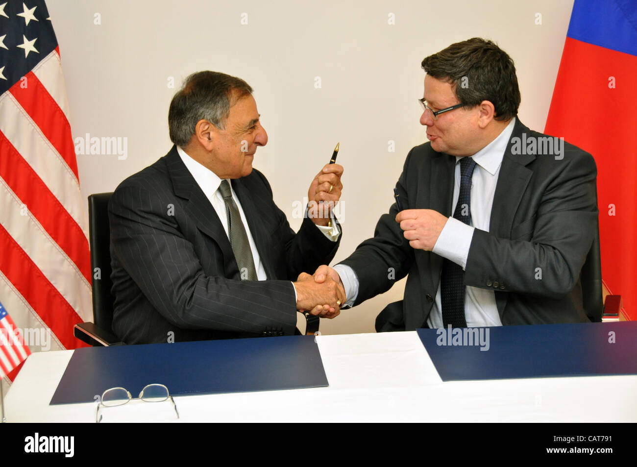 Czech minister of defence Alexandr Vondra (right) and his US counterpart Leon Panetta after they signed  contract which enable for the Czech arms dealers to tender directly for contracts defense area in USA in Brussels, Belgium on April 18, 2012. Direct access for open army contracts was till now bl Stock Photo