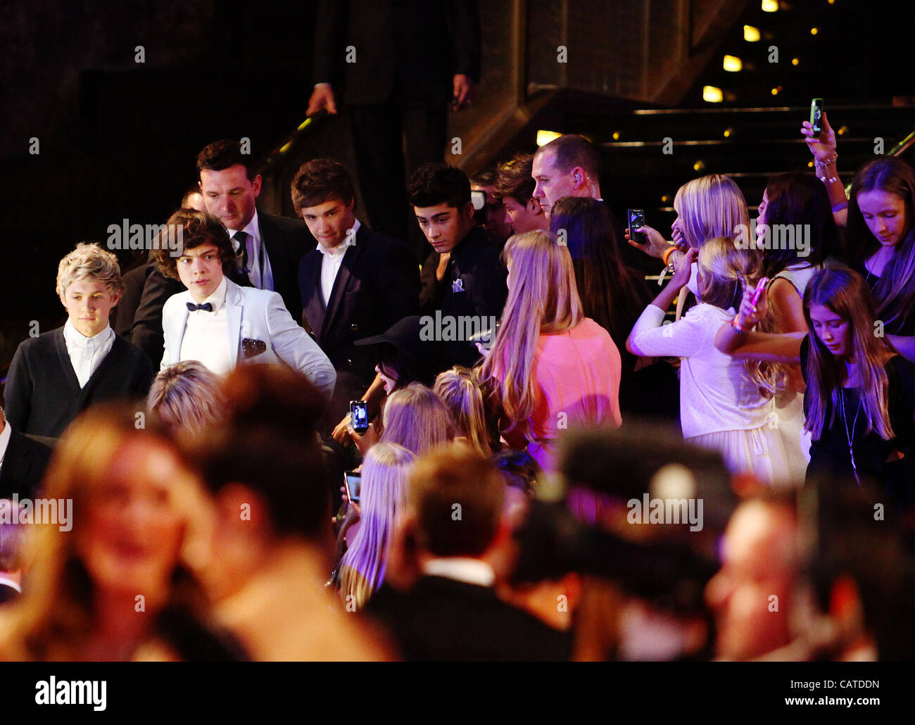 April 15, 2012 - Melbourne, NSW, Australia - Fans scream as memebers of the band One Direction NIALL HORAN and HARRY STYLES arrive at the 2012 TV Week Logie Awards in Melbourne at the Crown Casino. (Credit Image: © Marianna Massey/ZUMAPRESS.com) Stock Photo
