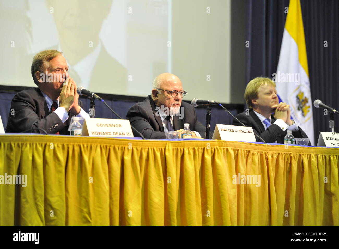 Governor Howard B. Dean III (left), Edward J. Rollins (center), and Lord Stewart Wood of Anfield (right) are panelists at "Change in the White House?” on Thursday, April 19, 2012, at Hofstra University, Hempstead, New York, USA. Hofstra's event was part of its “Debate 2012." Stock Photo