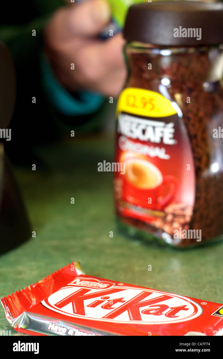 Images of Nestle products in a typical convenience store. Nestle is currently having a challenging year. Swiss company said sales, were up, but trading was subdued in many developed markets. Stock Photo