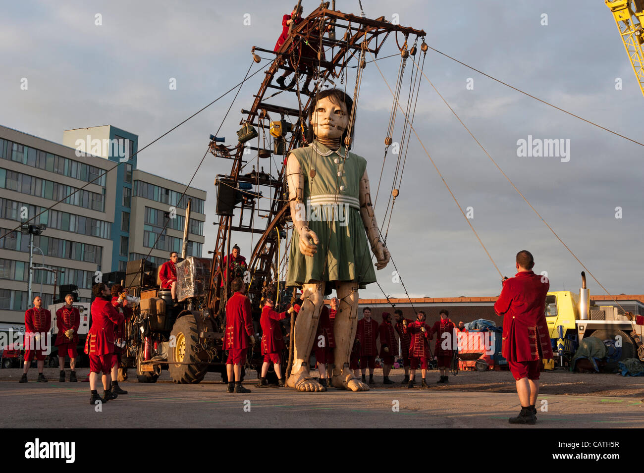 LIVERPOOL, UK, 20th April, 2012. The Sea Odyssey. The little girl giant. A massive puppet by Royal de Luxe as part of the Sea Odyssey event. Stock Photo