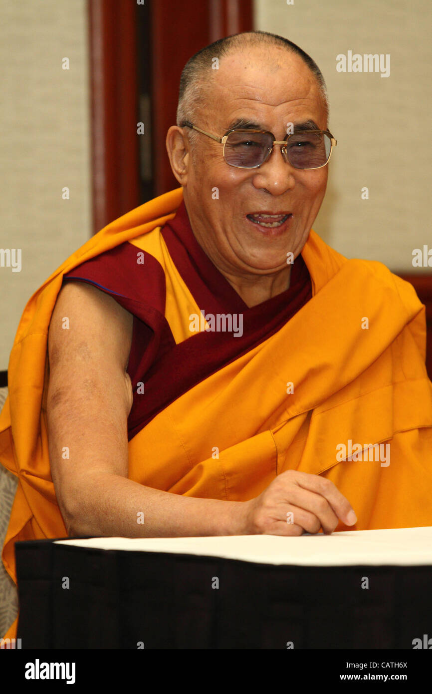 H.H. the XIV Dalai Lama gave a press conference at the Westin Hotel in Long Beach, CA on Friday, Apri 20th 2012. The Dalai Lama spoke of his 'Three Commitments' before answered questions concerning his relinquishment as political leader of the Tibetan Government in Exile, and recent self-immolation  Stock Photo