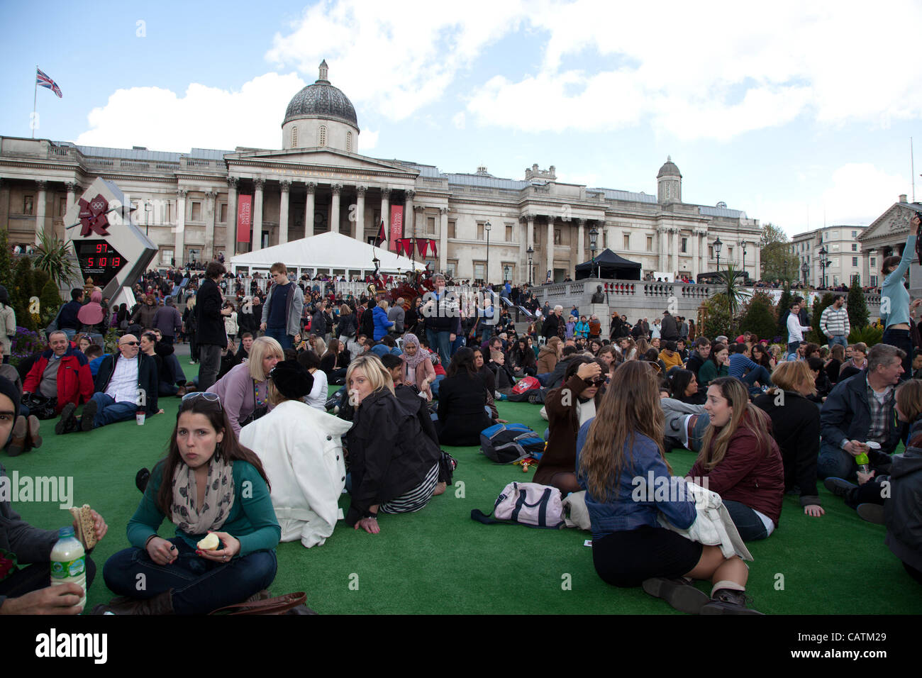 LONDON, UK. 21st Apr 2012 Trafalgar Square was turned into an English Garden for the St George's Day Festival. It featured pop-up gardening installations, floral art and exhibits of growing your own fruit and veg. A bandstand hosted traditional and modern musicians. Stock Photo