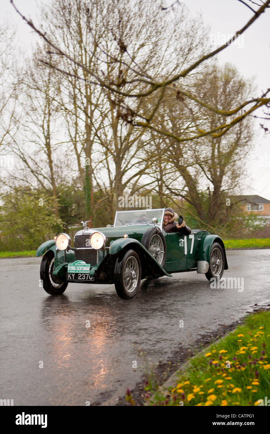 1932 Alvis Speed 20 A 1932 crewed by Graham Robertson (GB) and Christine Robertson (GB) competing in The 4th. Flying Scotsman Rally 2012 organized by The Endurance Rally Association passing through Kirton Holme Nr. Boston in Lincolnshire on the first day of the rally on Friday 20th. April. Stock Photo