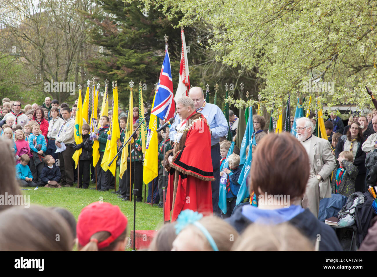 The Mayor of Taunton addressing the Girl Guides and Boy Scouts in Vivary Park, Taunton, Somerset, England on Sunday April 22nd 2012. This followed a parade through Taunton town centre to mark St Georges day, a traditional celebration of the patron Saint of England. Stock Photo