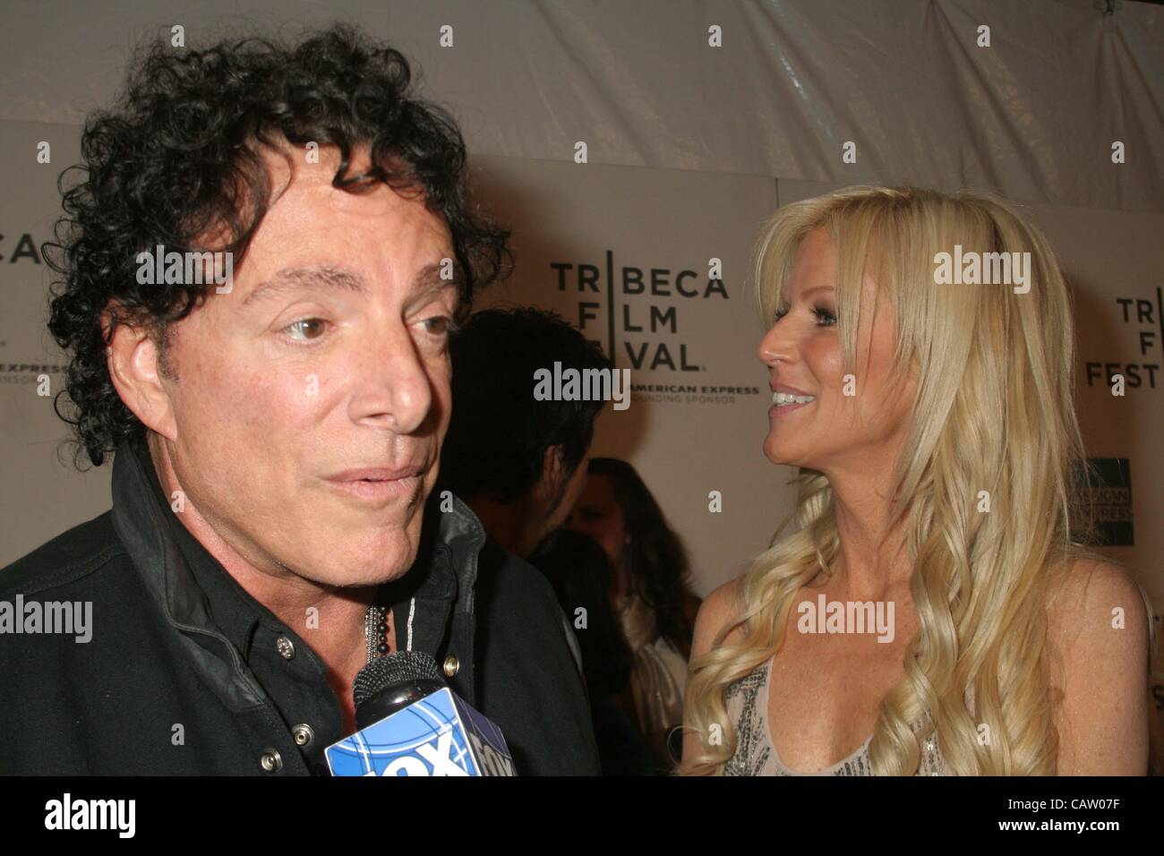 April 19, 2012 - New York, New York, U.S. - NEAL SCHON AND GIRL FRIEND  MICHAELE SALAHI. World premiere Do Not Stop Believin Everyman's Journey in Tribeca Film Festival , New York City 4-19-2012.(Credit Image: Â© Mitchell Levy/Globe Photos/ZUMAPRESS.com) Stock Photo