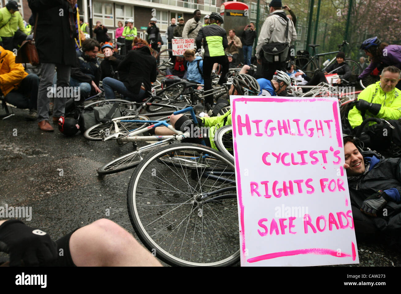 London,UK,23/04/2012.  Die in protest  staged by cyclists angry at Addison Lee Chairman John  Griffin's alleged anti-cycling article in company's customer  magazine Add Lib. Stock Photo