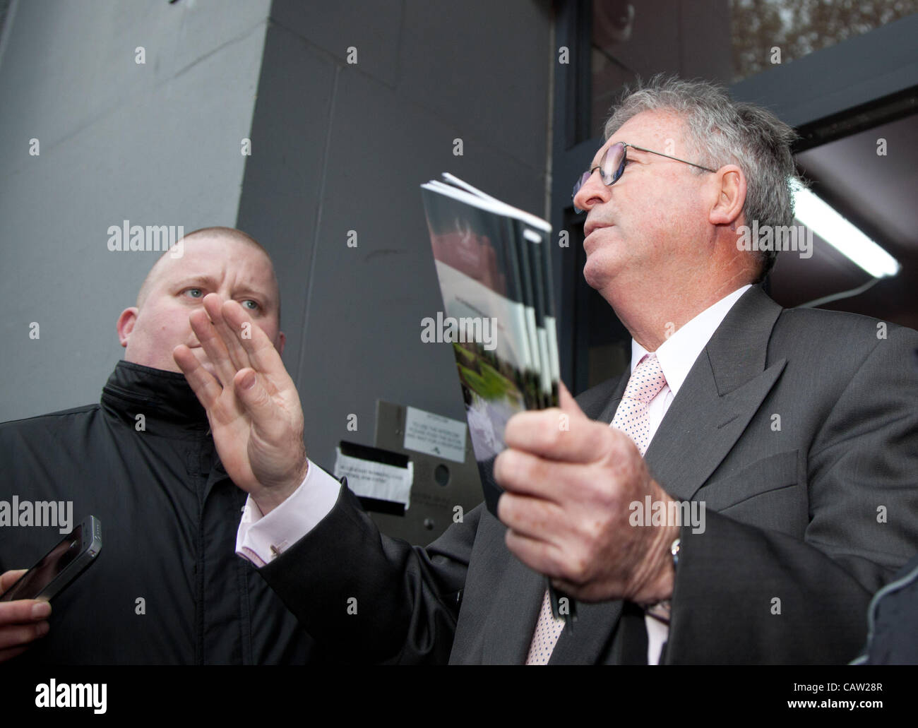 LONDON, UK, 23rd, Apr, 2012 John Griffin talks to the protestors. Cyclists gathered outside the Addison offices to protest against the recent comments by the chairman John Griffin, who claimed they are “throwing themselves onto (the road)” and that training is urgently required, along with insurance Stock Photo