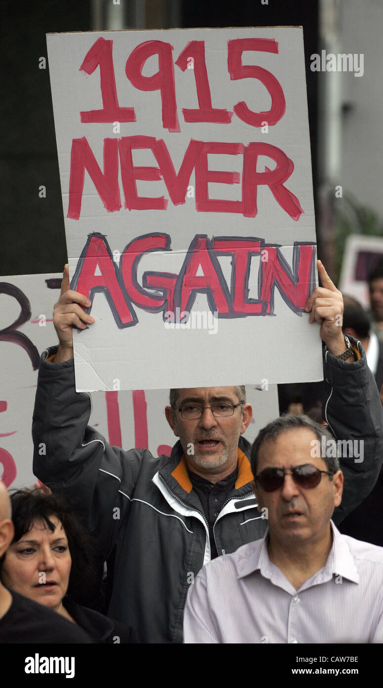 April 24, 2012 - Los Angeles, California, U.S. - Armenians and their supporters carry signs during a protest to mark the 97th anniversary of the beginning of the Armenian genocide and to call on the Turkish government to recognize the deaths of about 1.5 million people, in front of the Turkish Consu Stock Photo