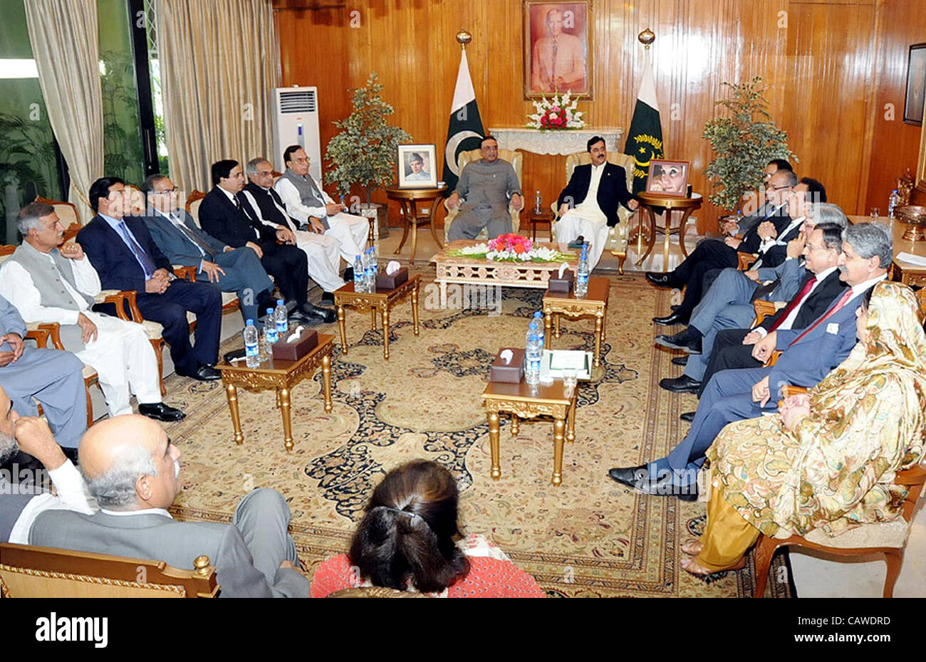 President, Asif Ali Zardari and Prime Minister, Syed Yousuf Raza Gilani chair a meeting of Senior Leadership of Peoples Party (PPP) held at Aiwan-e-Sadr in Islamabad on Thursday, April 26, 2012 Stock Photo