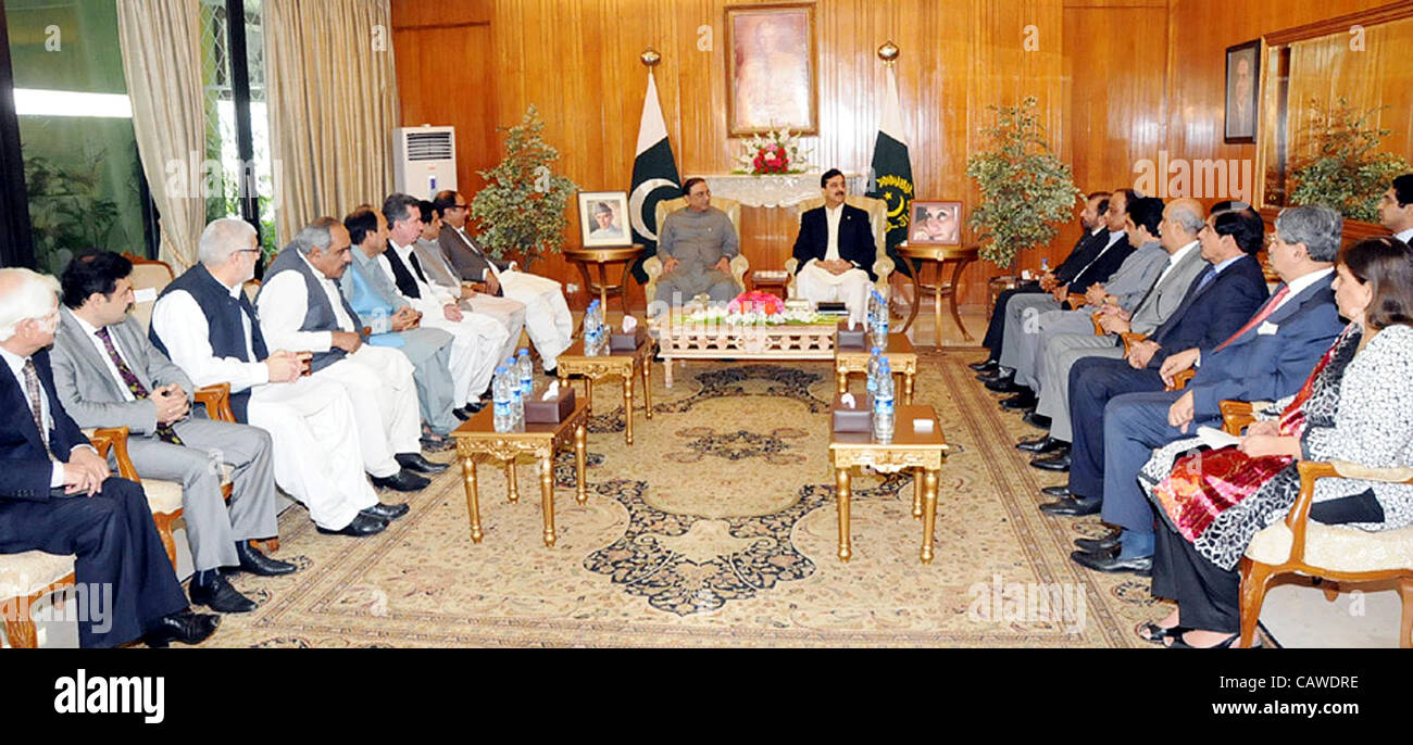 President, Asif Ali Zardari and Prime Minister, Syed Yousuf Raza Gilani chair a meeting of Coalition Partners held at Aiwan-e-Sadr in Islamabad on Thursday, April 26, 2012. ). Stock Photo