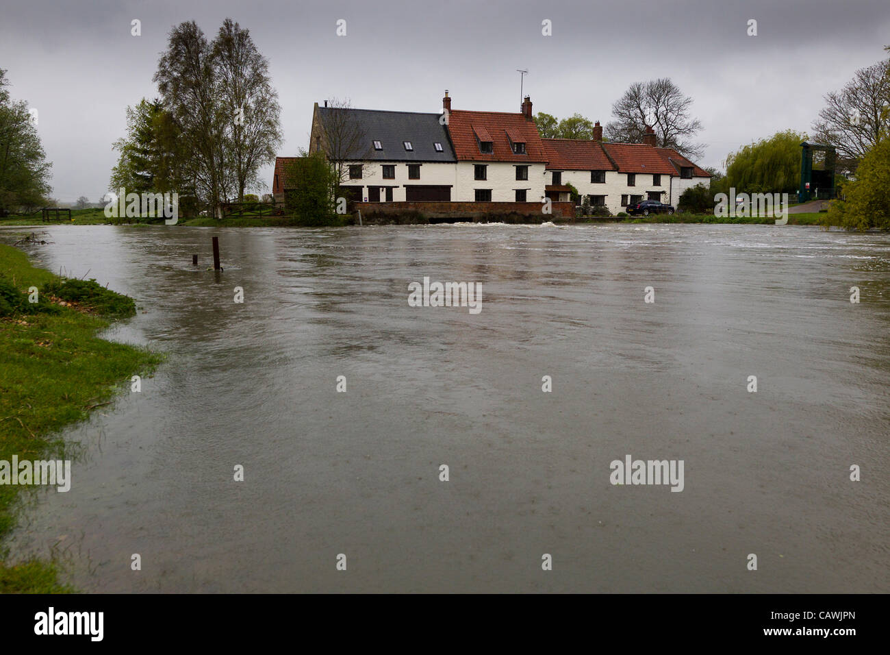 Rain swollen river hires stock photography and images Alamy