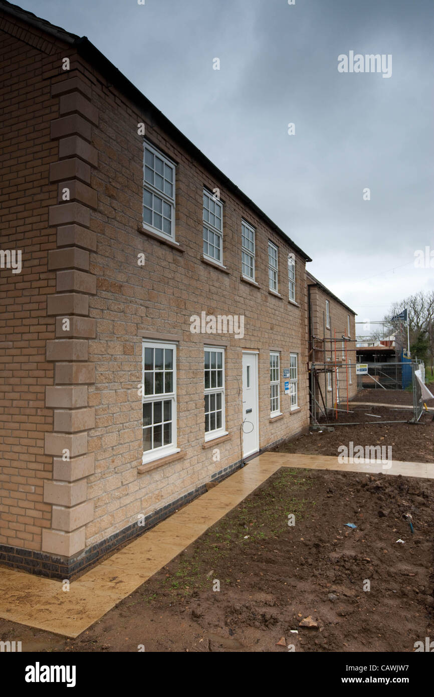 Stamford,Lincolnshire,UK 27.4.2012 Construction workers build on a