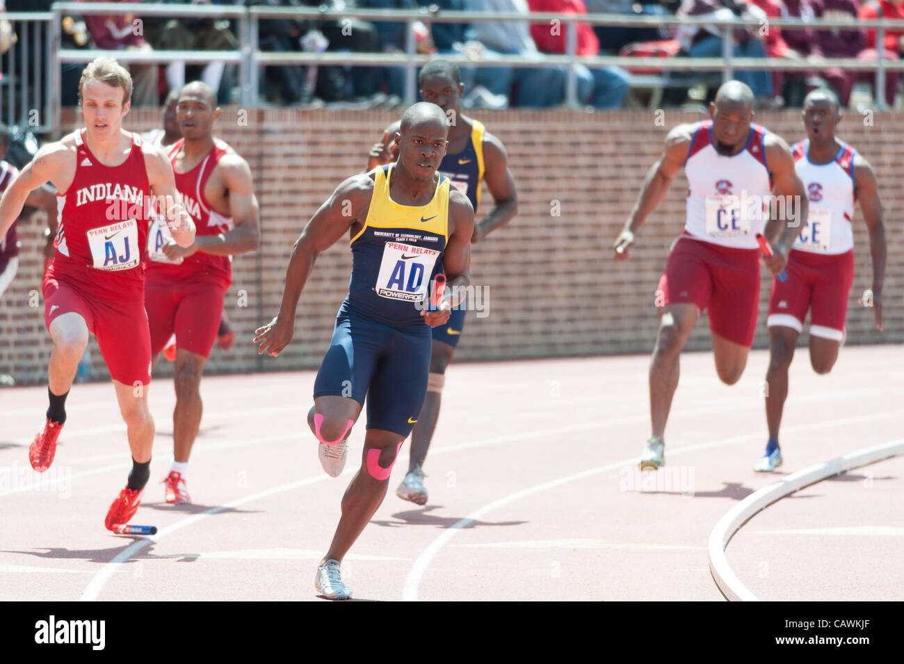 April 27, 2012 - Philadelphia, PA, U.S - INDIANA and UTECH of Jamaica compete in the mens college 4x100 at the 2012 Penn Relays in Philadelphia at Franklin Field. (Credit Image: © Ricky Fitchett/ZUMAPRESS.com) Stock Photo