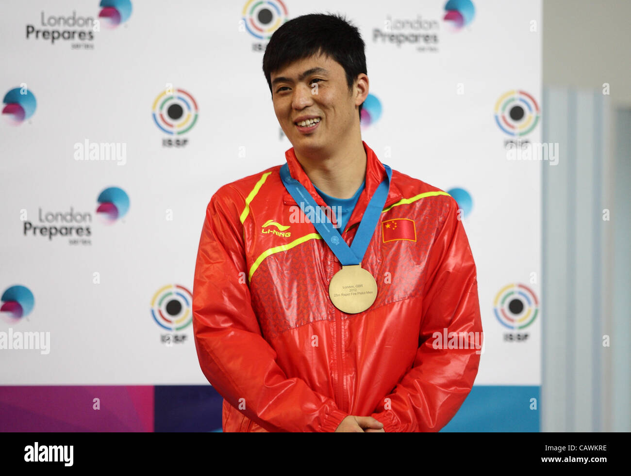 27.04.2012 London, England. The bronze medalist of the mens 25m Rapid Fire Pistol competition Jian Zhang (CHN). Stock Photo