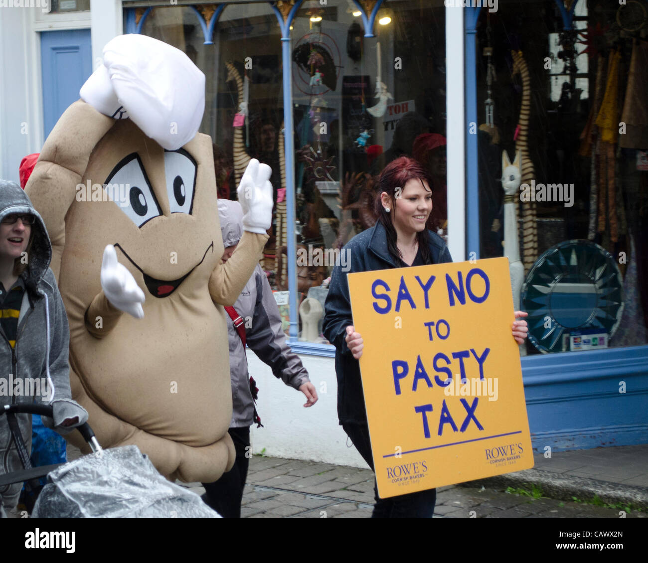 Falmouth, Cornwall. 29 April, 2012. Hundreds of people walk through the streets of Falmouth, Cornwall, in protest against the so-called "pasty tax" being proposed by the Government. Stock Photo