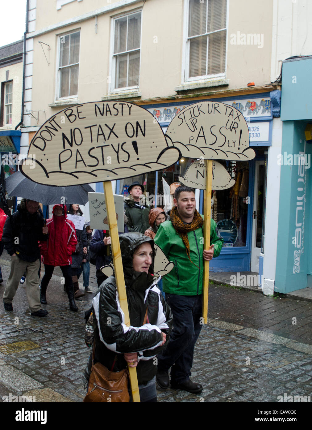 Falmouth, Cornwall. 29 April, 2012. Hundreds of people walk through the streets of Falmouth, Cornwall, in protest against the so-called 'pasty tax' being proposed by the Government. Stock Photo