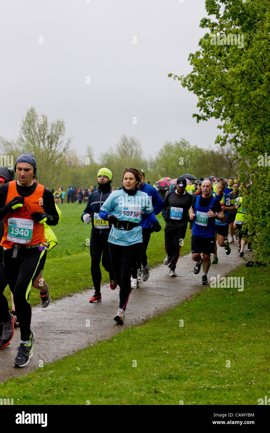 Milton Keynes, UK. 29 April, 2012. Runners take part in the Milton Keynes Marathon in the