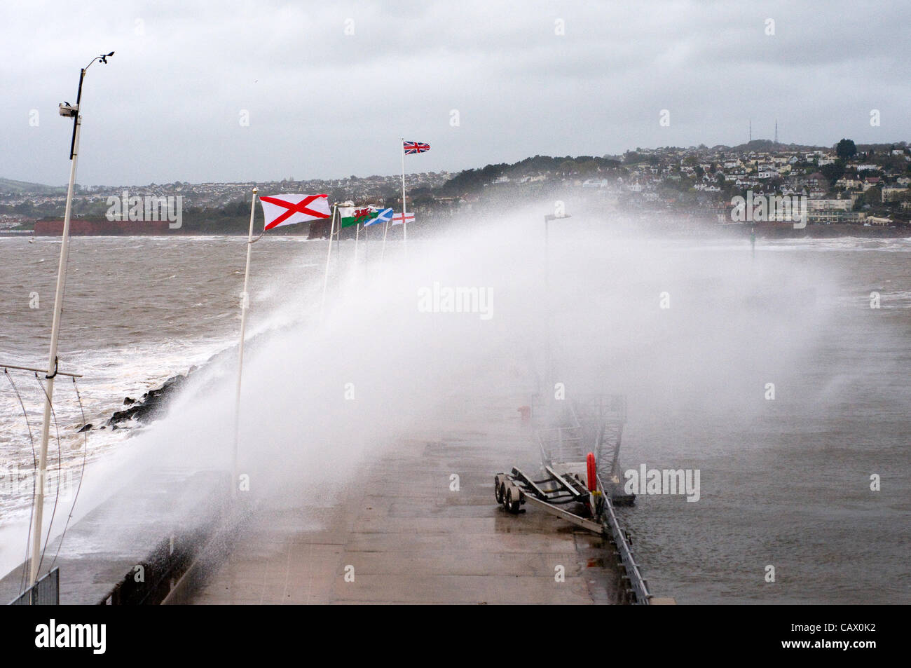 Torquay, UK. 30 April, 2012. High waves crash over the sea wall at Torquay, Devon, as storms and rain hit the South Coast of the UK.England* Stock Photo