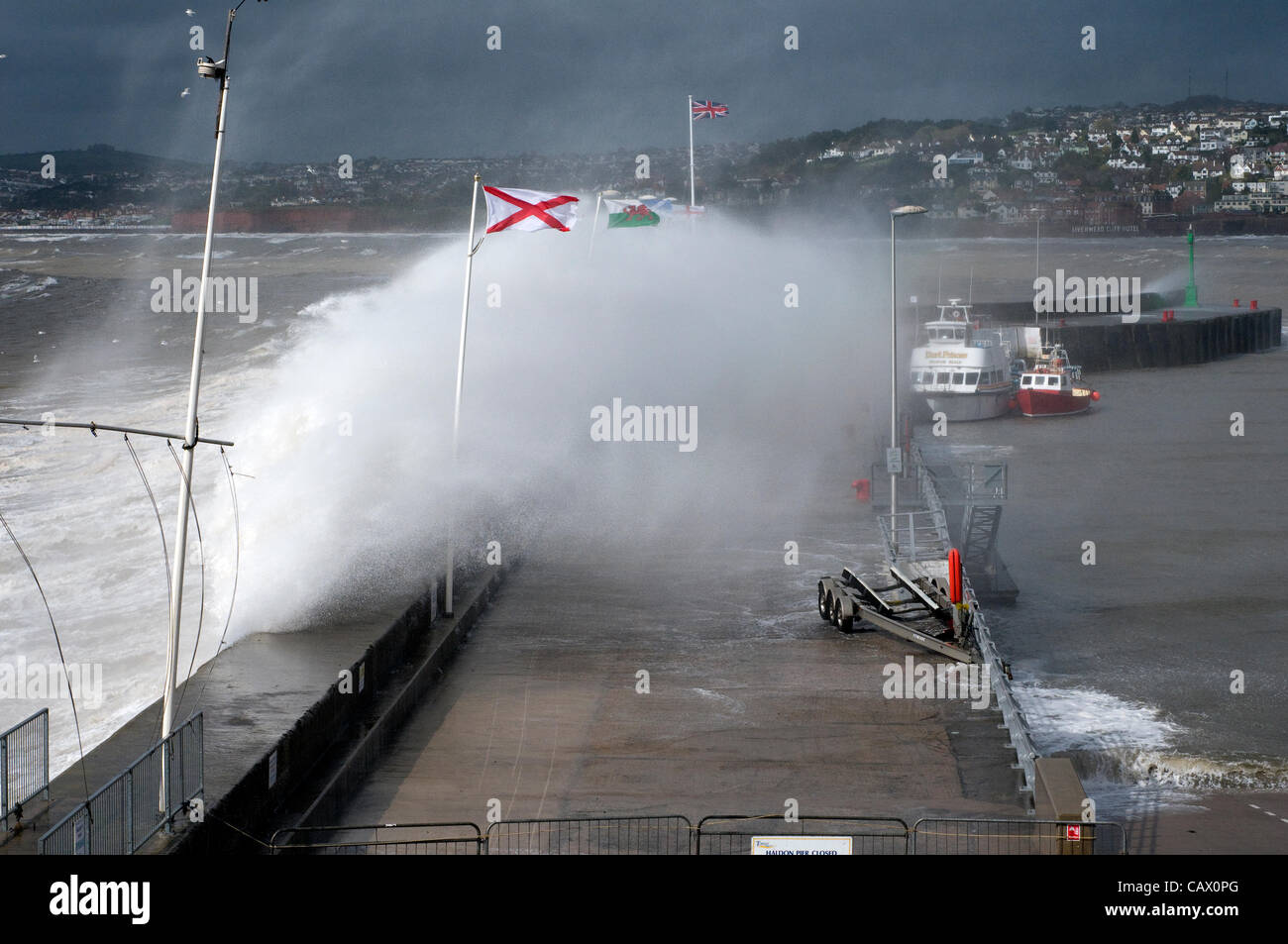Torquay, UK. 30 April, 2012. High waves crash over the sea wall at Torquay, Devon, as storms and rain hit the South Coast of the UK.England Stock Photo
