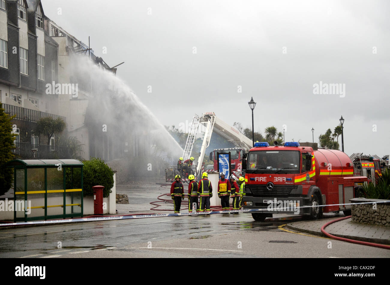 Falmouth, Cornwall, UK. Firefighters tackle the fire at the Falmouth Beach Hotel on Monday 30th April 2012 Stock Photo