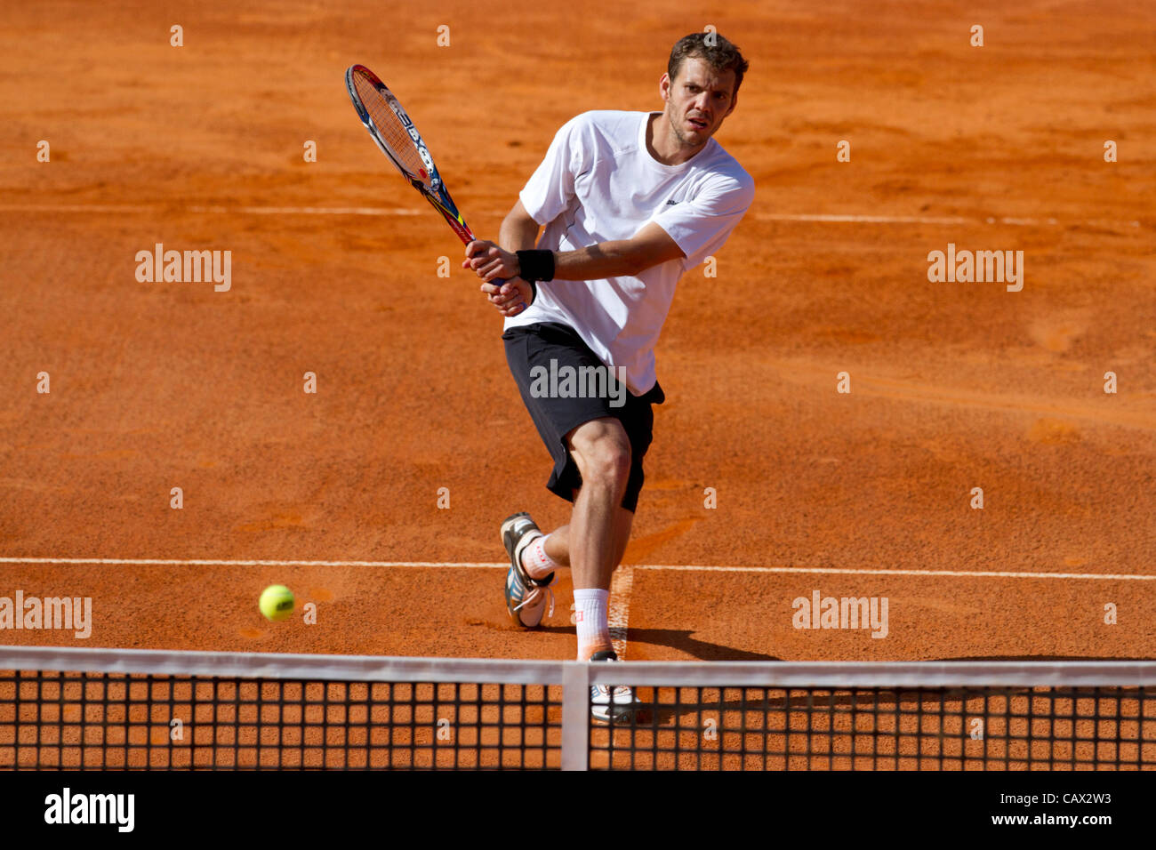 30.04.2012.  - Lisbon, Portugal -  Denis Istomin (UZB) defeated Paul-Henri Mathieu (FRA)  by 7-6 and 6-1 on the Estoril open Stock Photo