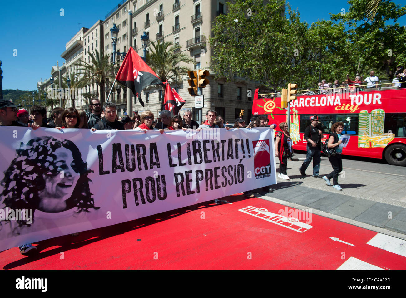 Barcelona,Spain. 1 May,2012. Anarchist CGT Union commemorate May Day and protest  the  the arrest of his partner Laura Gomez arrested during the general strike on March 29 against the new labor reform law. Stock Photo