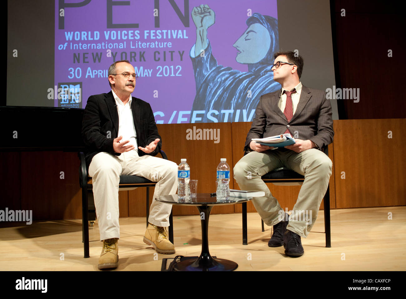Journalist Wojciech Jagielski discusses his book, 'Night Wanderers:  Uganda's Children and the Lord's Resistance Army' (Seven Stories, 2012), with Joel Whitney (editor, 'Guernica' magazine) at the Brooklyn Public Library as part of the PEN World Voices Festival in New York. Stock Photo
