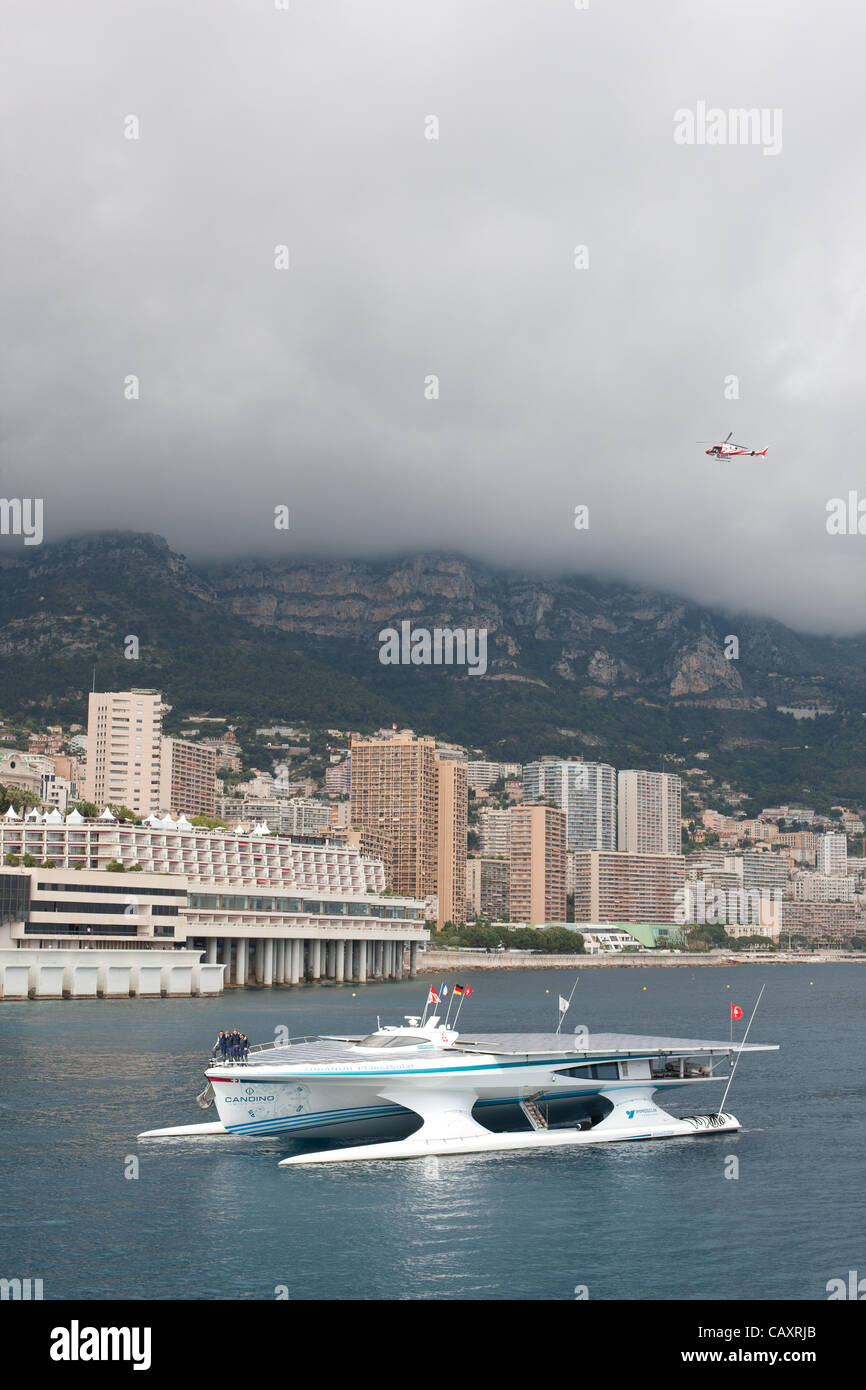 Turanor PlanetSolar Catamaran arrives in Monaco on May 04, 2012. it is the first circumnavigation of the world on a solar-powered boat. Raphaël Domjan (second from left) is the initiator and the leader of the expedition. Stock Photo