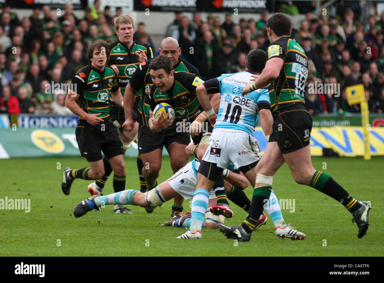 05.05.2012 Northampton, England. Rugby Union. Northampton Saints v Worcester Warriors. Phil DOWSON of Northampton Saints is tackled by James PERCIVAL of Worcester Warriors during the Aviva Premiership match between Northampton Saints and Worcester Warriors at Franklin's Gardens.  Final score: Northa Stock Photo