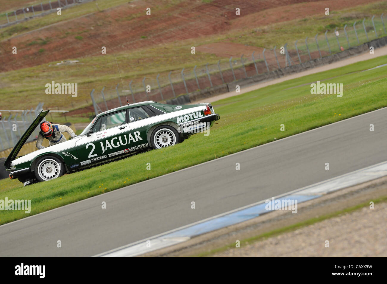 5th May 2012, Donington Park Racing Circuit, UK.  The Jaguar TWR XJS of ALex Buncombe and Gary Pearson broken down at the Donington Historic Festival Stock Photo