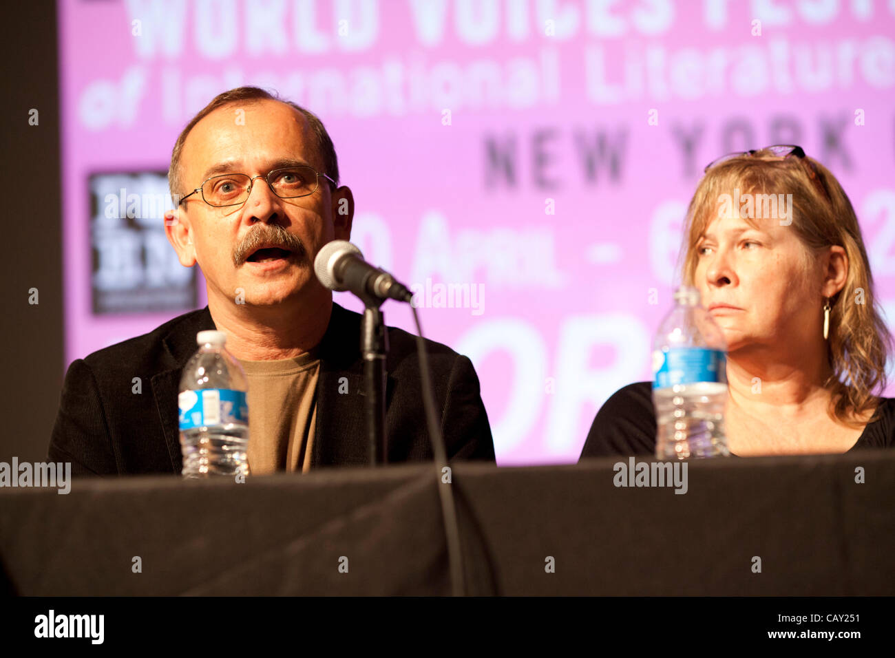 Panel on Children's Rights at Pen World Voices Festival, New York, NY, May 5, 2012, with moderator Susanna Reich (PEN), Polish Journalist Wojciech Jagielski (L), authors Debby Dahl Edwardson (R) and Patricia McCormack, and former child soldier Arn Chorn-Pond Stock Photo