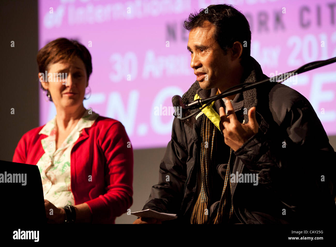 Panel on Children's Rights at Pen World Voices Festival, New York, NY, May 5, 2012, with co-authors Patricia McCormack (L) and former Cambodian child soldier Arn Chorn-Pond (R). Stock Photo