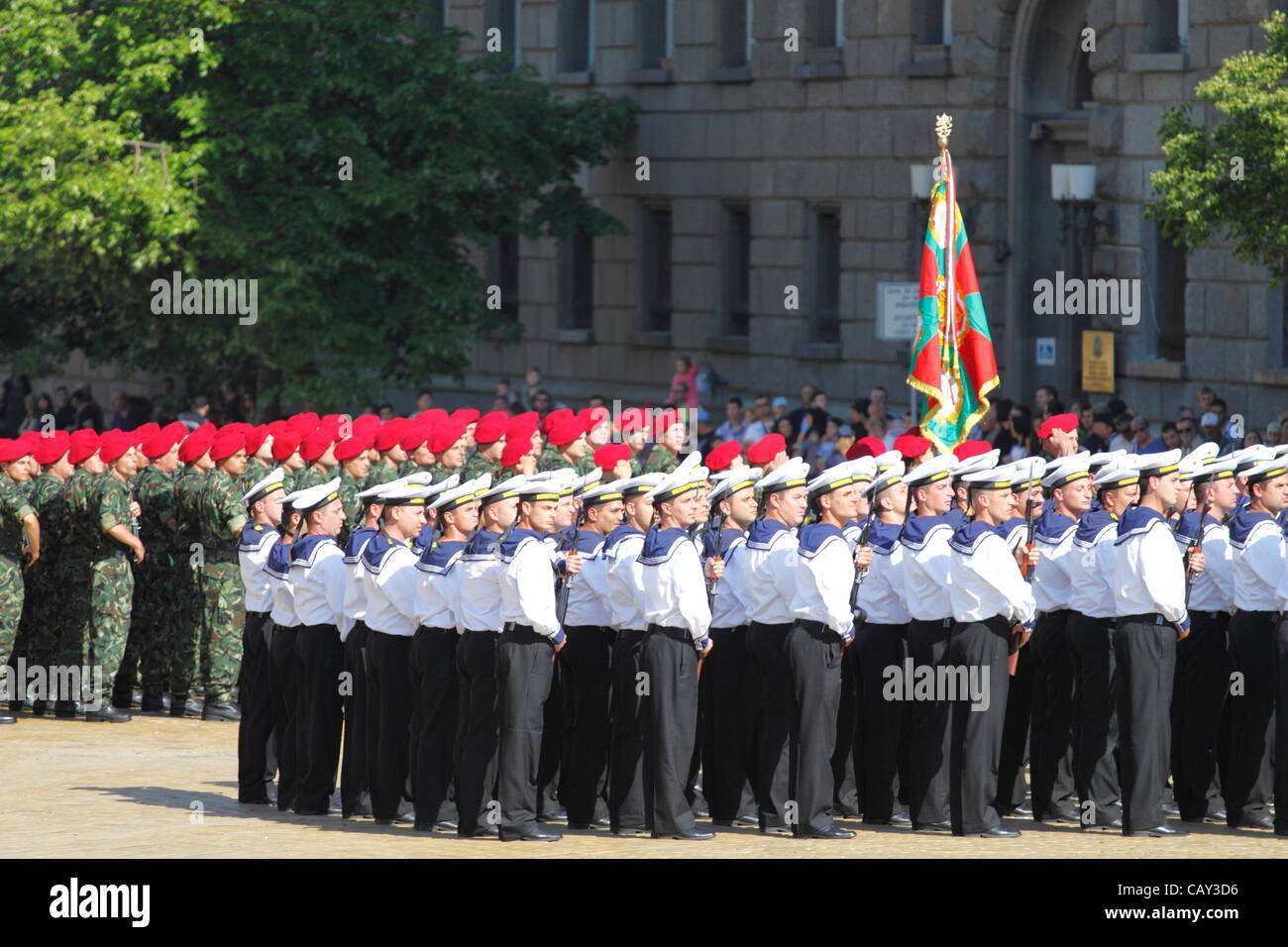 Formations of the Bulgarian Navy and Land Forces (background with red berets) participating in the parade on Bulgarian Army Day in the center of Sofia, Bulgaria, 6 May 2012 Stock Photo