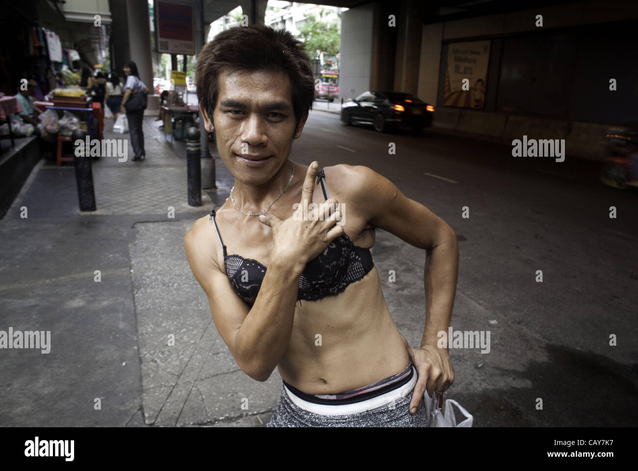 May 8, 2012 - Bangkok, Thailand - Know as ''Ladyboys'' a Gay man poses for photographs in downtown Bangkok, Thailand, Tuesday, May 8, 2012. (Credit Image: © David Longstreath/ZUMAPRESS.com) Stock Photo