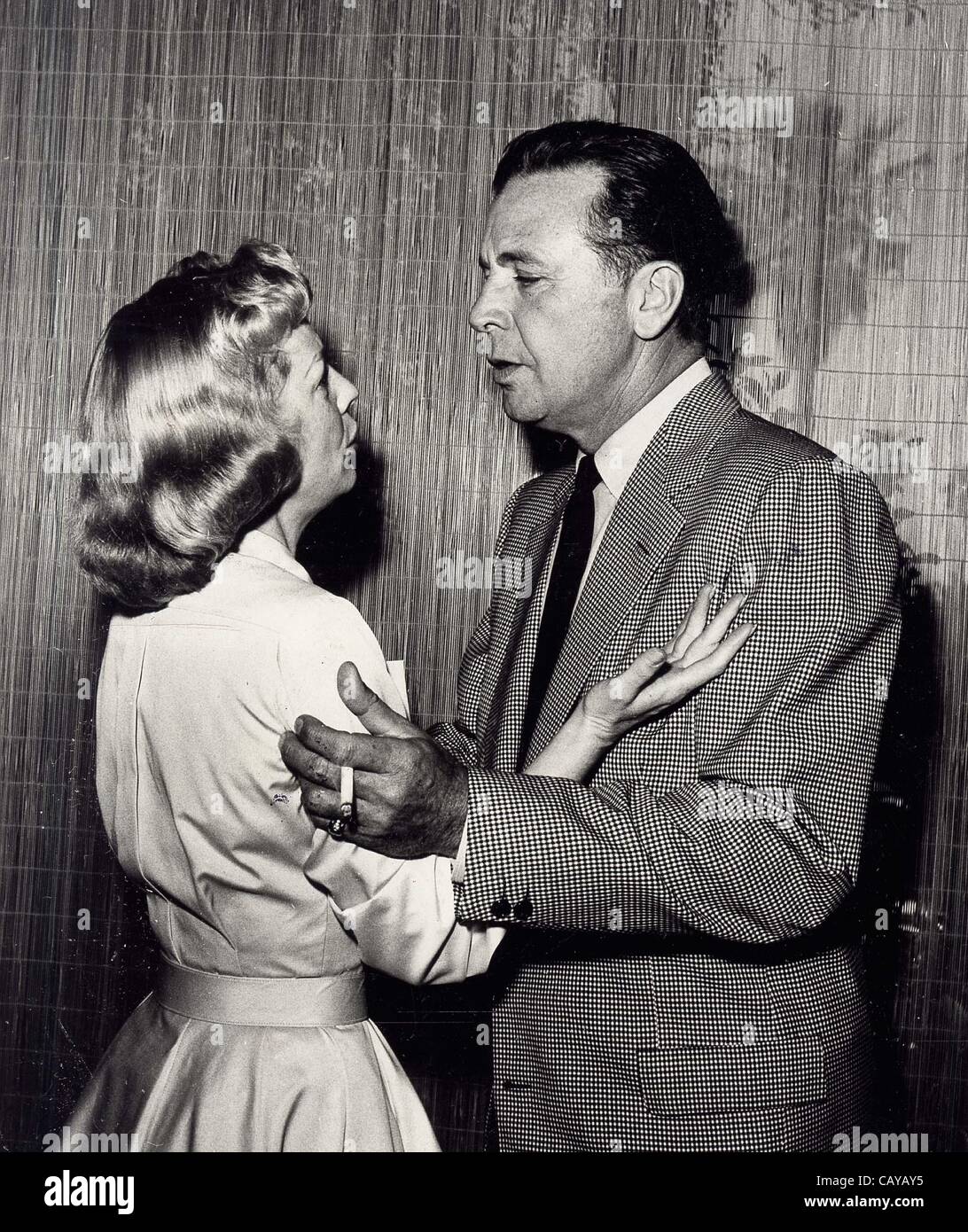 DICK POWELL with wife June Allyson.They've been married eleven years ...