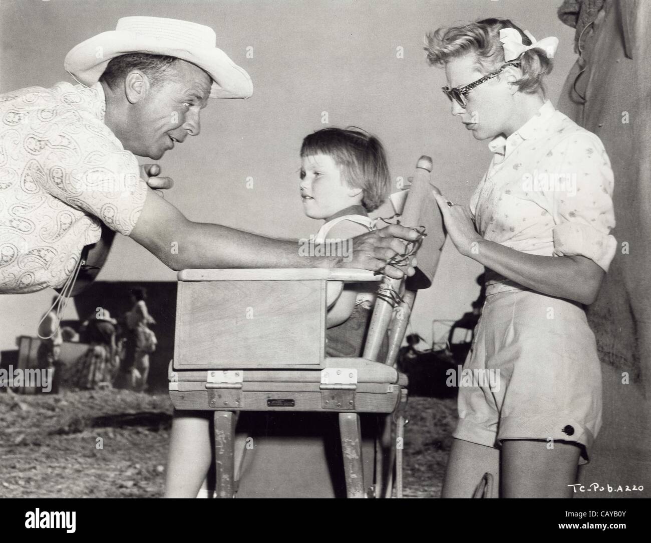 DICK POWELL (Director) with daughter Pamela Ellen Powell and wife June  Allyson.Supplied by Photos inc..The Conqueror 1956.(Credit Image: Â©  Supplied By Globe Photos Inc/Globe Photos/ZUMAPRESS.com Stock Photo - Alamy