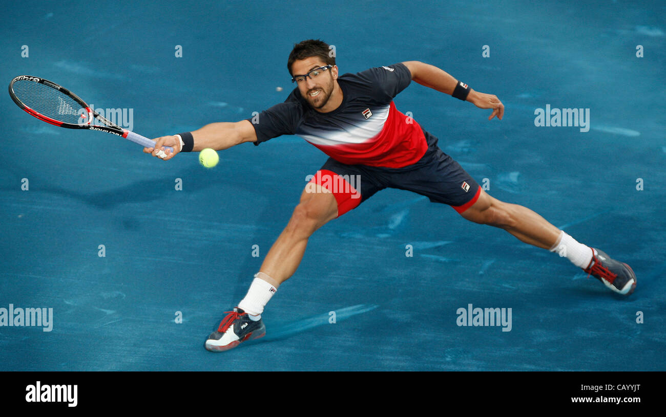 11.05.2012 Madrid, Spain. Janko Tipsarevic  in action against Novak Djokovic during the  quarter finals of the Madrid Open Tennis Tournament. Stock Photo