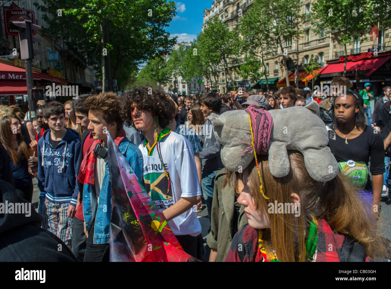 large multicultural crowd of French Teenagers Marching at 'World Cannabis March for Marijuana Legalization' - prohibition pot protest for medical marijuana Paris, FRANCE YOUTH DEMO, people march street, political participation youth Stock Photo